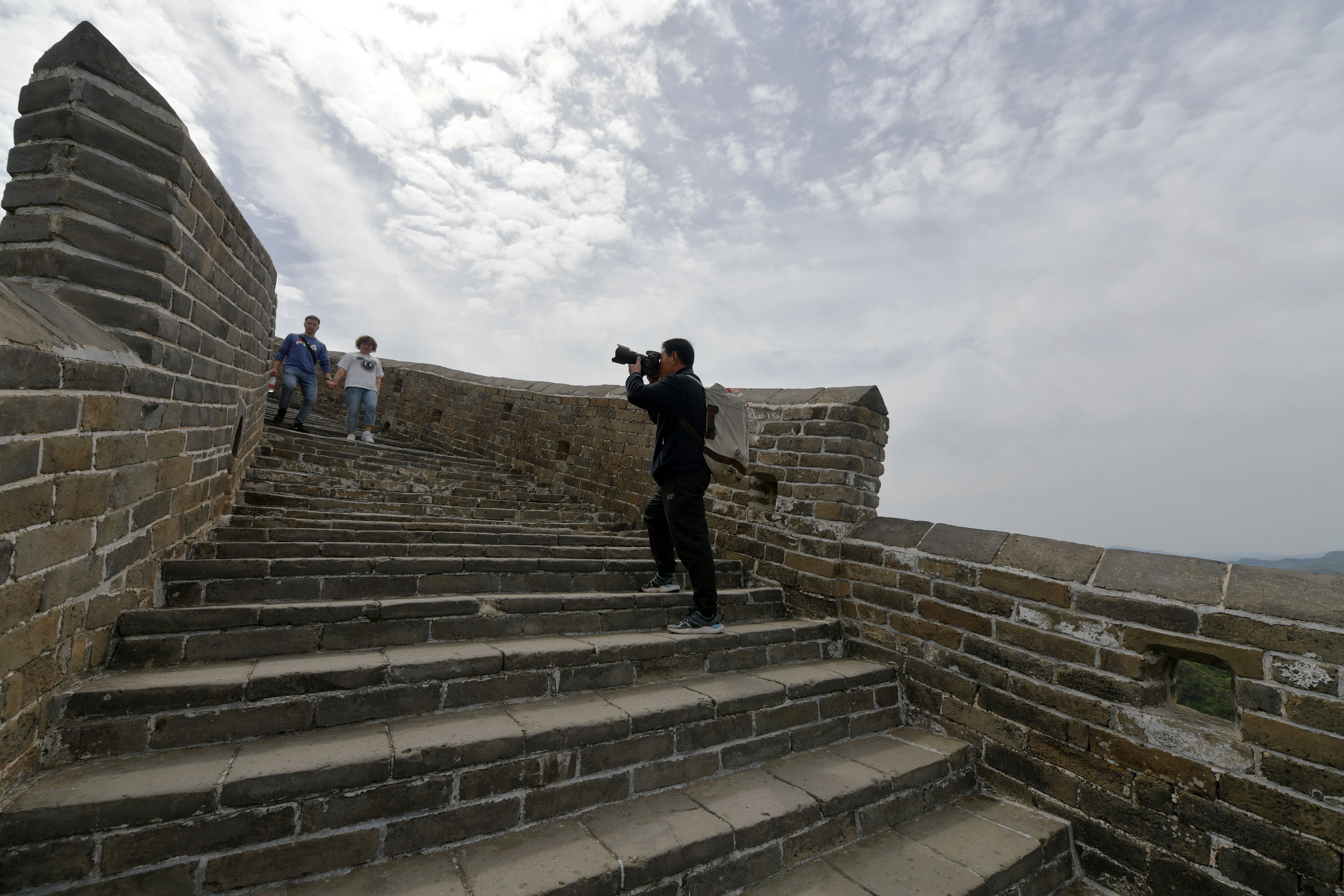 Zhou Wanping has been taking photos of the Great Wall for decades. / CNSPHOTO