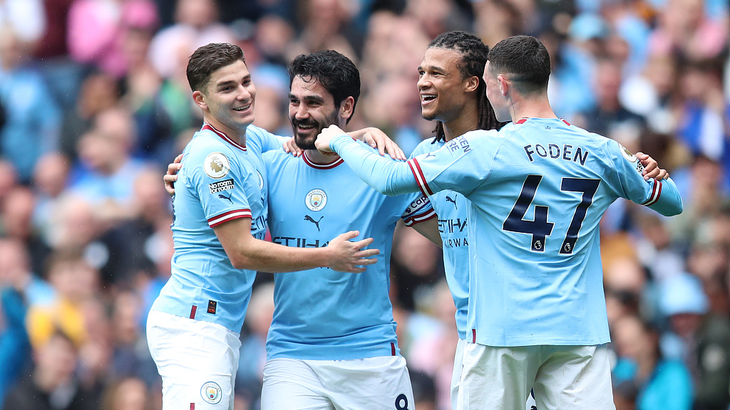 Manchester City players celebrate during a Premier League match against Leeds United in Manchester, UK, May 6, 2023. /CFP