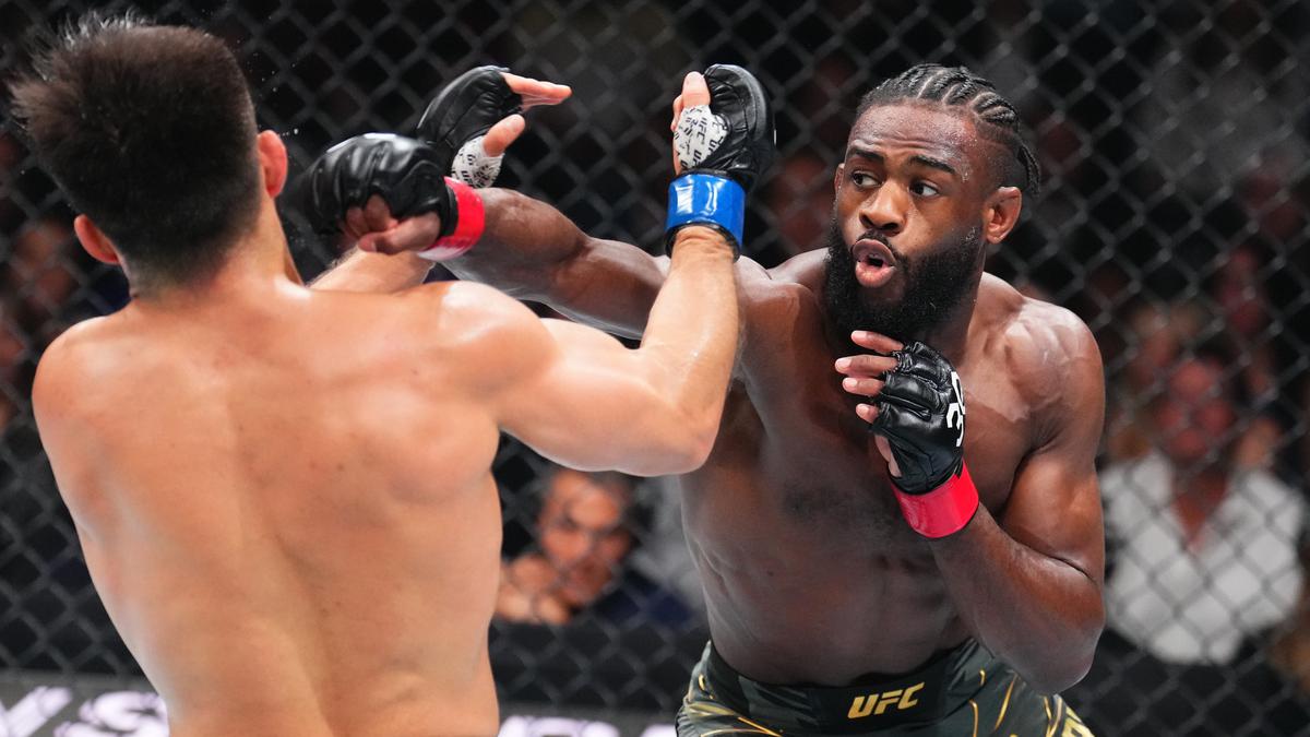Aljamain Sterling hits Henry Cejudo with a right straight punch. /Zuffa
