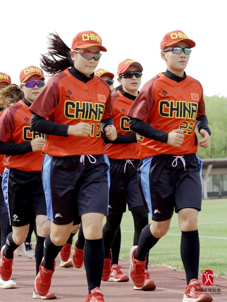 Players of the Chinese women's national softball team practice. /Chinese Softball Association