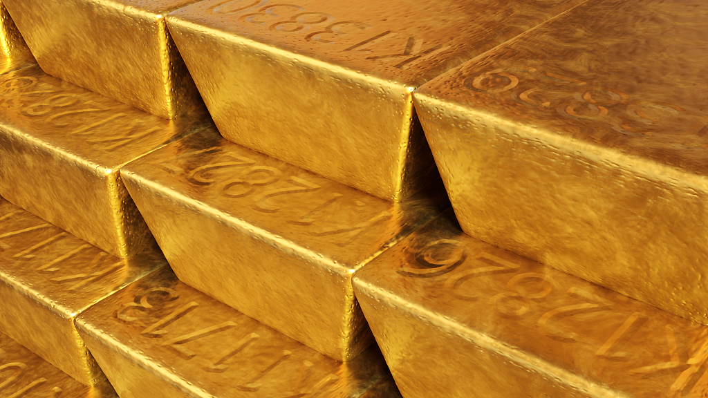 An image of stacked gold bars. /CFP