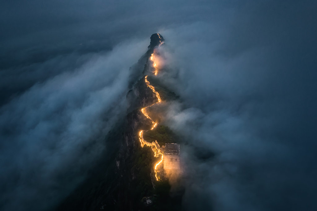 A view of the illuminated Simatai section of the Great Wall in Beijing. /CFP