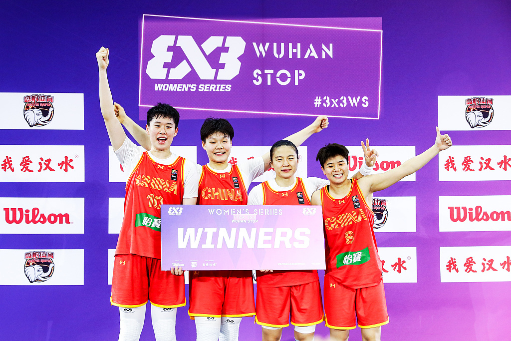 L-R: Zhang Zhiting, Wan Jiyuan, Wang Lili and Zhang Yi of China celebrate on the podium after winning the FIBA 3x3 Women's Series in Wuhan, China, May 7, 2023. /CFP