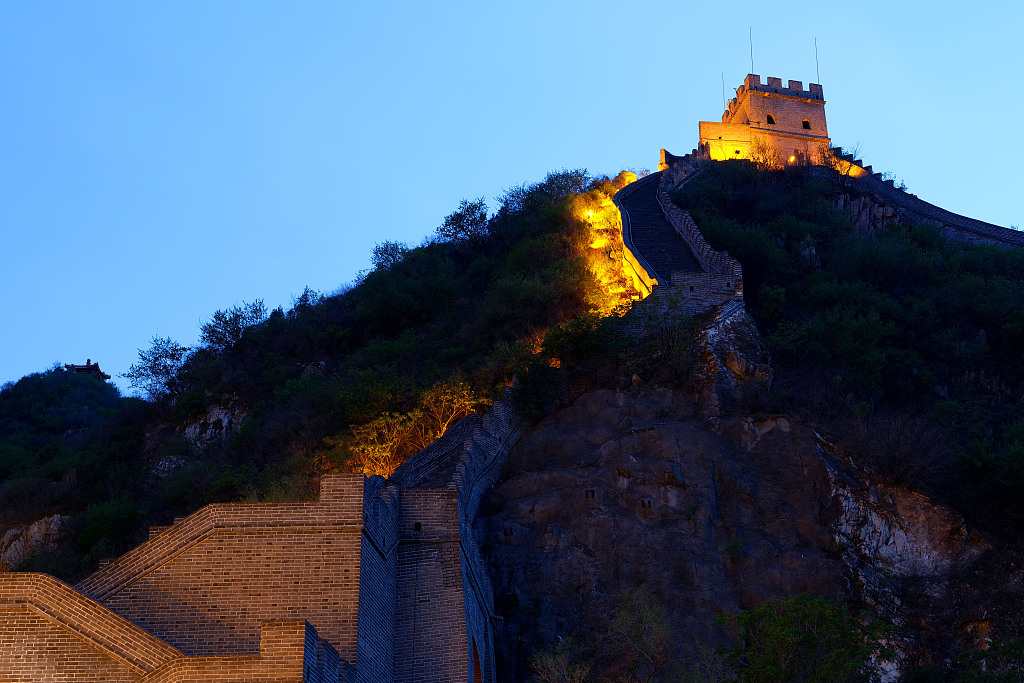 The Juyongguan section of the Great Wall in Beijing beams brightly after nightfall. /CFP