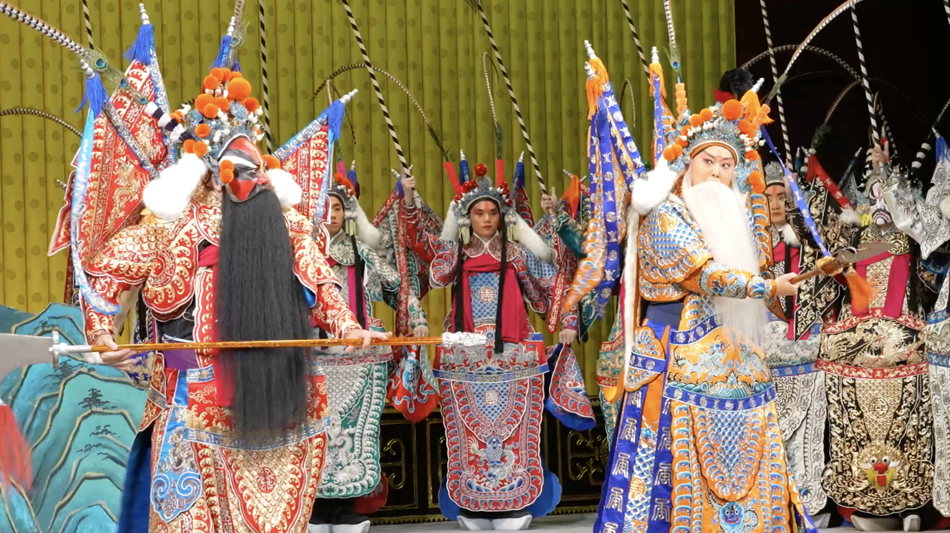 Tan Xiaoyu (front, and right) performs 