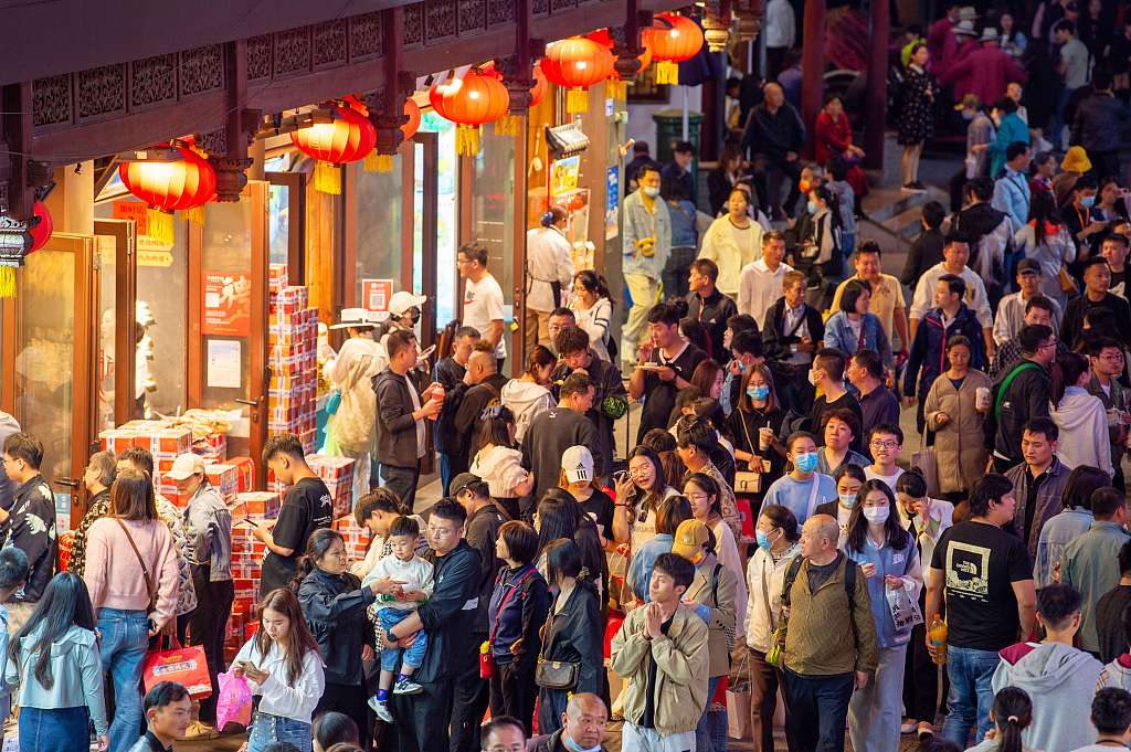 Hordes of visitors throng Confucius Temple in Nanjing, Jiangsu, on May 7, 2023. /CFP