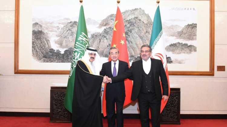Wang Yi (C), a member of the Political Bureau of the Communist Party of China (CPC) Central Committee and director of the Office of the Foreign Affairs Commission of the CPC Central Committee, attends a closing meeting of the talks between the Saudi delegation led by Musaad bin Mohammed Al-Aiban (L), Saudi Arabia's Minister of State, Member of the Council of Ministers and National Security Advisor, and Iranian delegation led by Admiral Ali Shamkhani (R), Secretary of the Supreme National Security Council of Iran, in Beijing, capital of China, March 10, 2023. /Xinhua