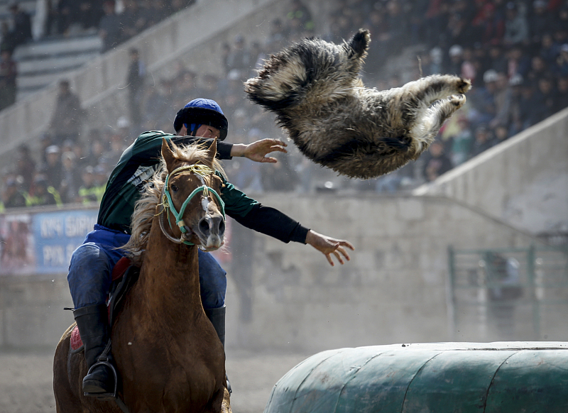 Riders participate in a traditional game of Kok Boru in Kyrgyz Republic. /CFP