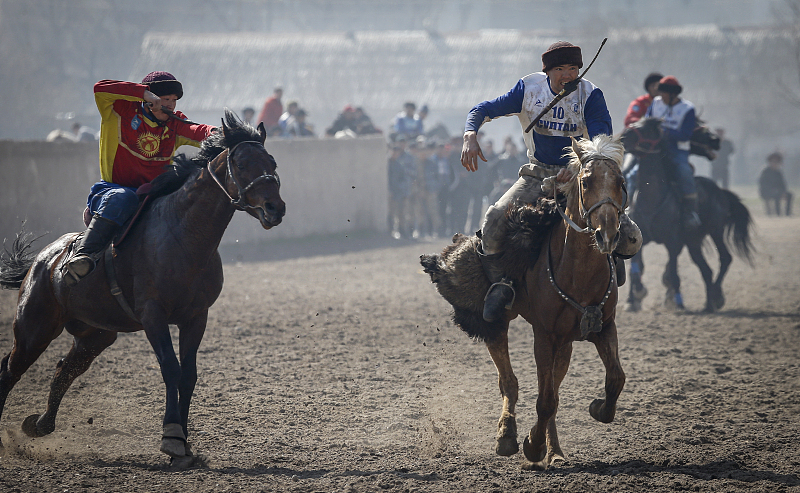 Riders participate in a traditional game of Kok Boru in Kyrgyz Republic. /CFP