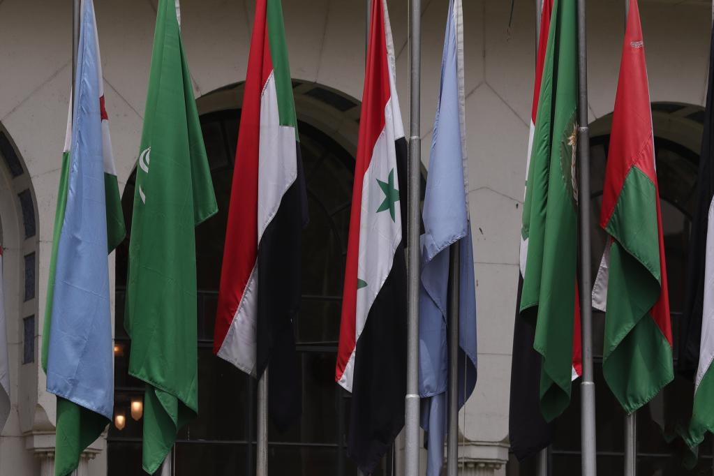 This photo taken on May 7, 2023 shows the national flag of Syria (4th L) at the headquarters of the Arab League in Cairo, Egypt. /Xinhua