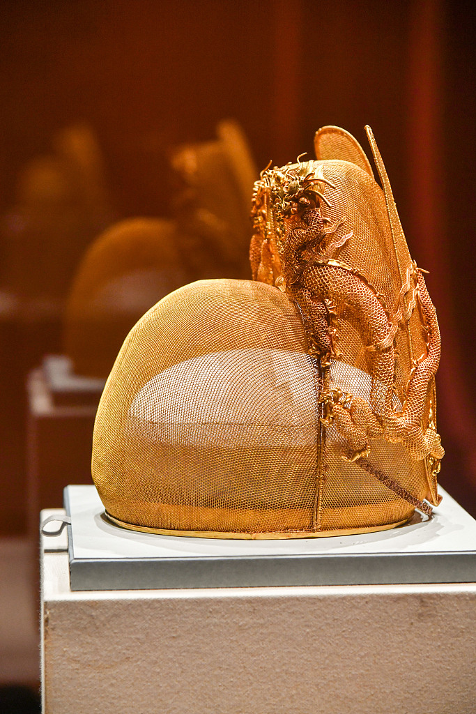 The gold mesh crown of Wanli Emperor is on display at the National Museum of Classic Books in Beijing on May 10, 2023. /CFP