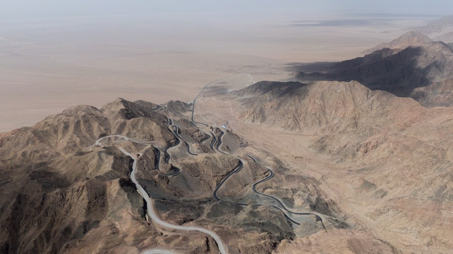 An aerial photo shows a winding mountain road leading to the Lenghu observatory site in northwest China's Qinghai Province, April 8, 2023. /Xinhua