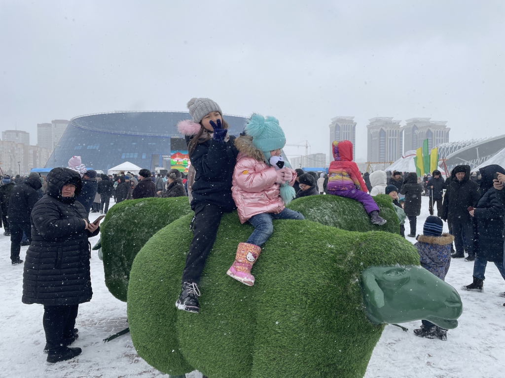 People enjoy Nowruz Day celebrations outdoors in Astana, capital of Kazakhstan, on March 22, 2022. /CFP