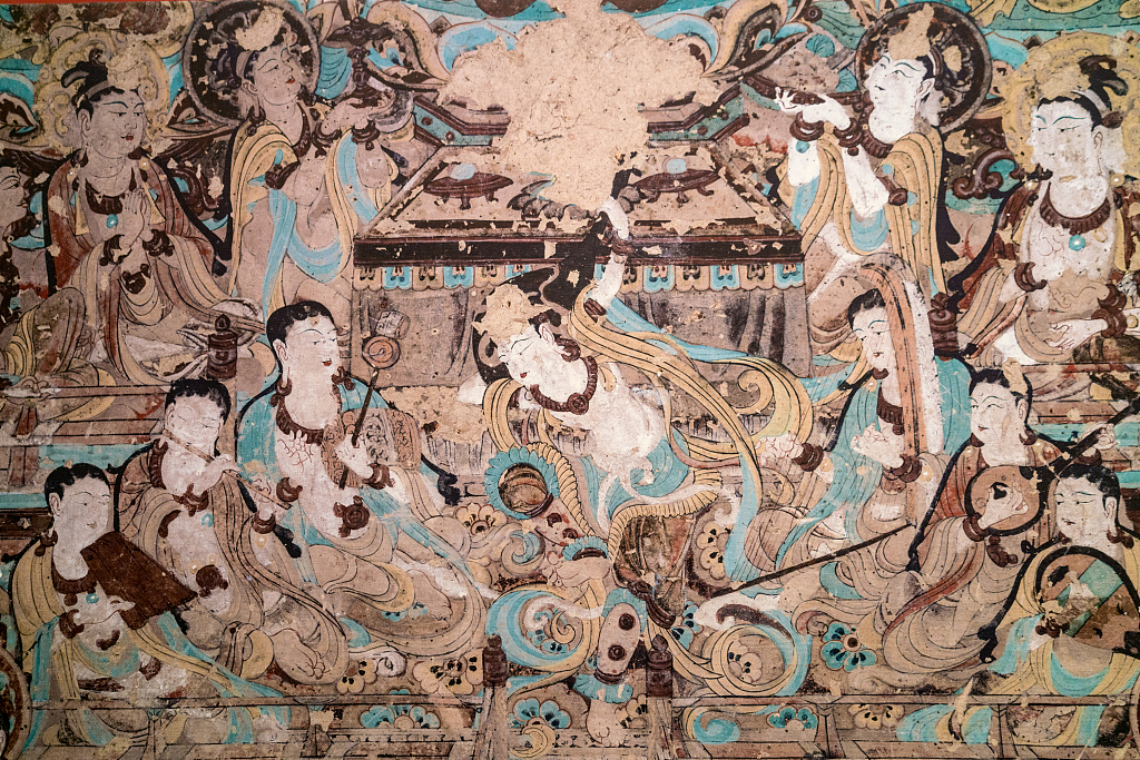 The murals of the Mogao Caves are gems of Buddhist art. These artworks show influences from India and Central Asia in terms of both content and painting techniques. /CFP