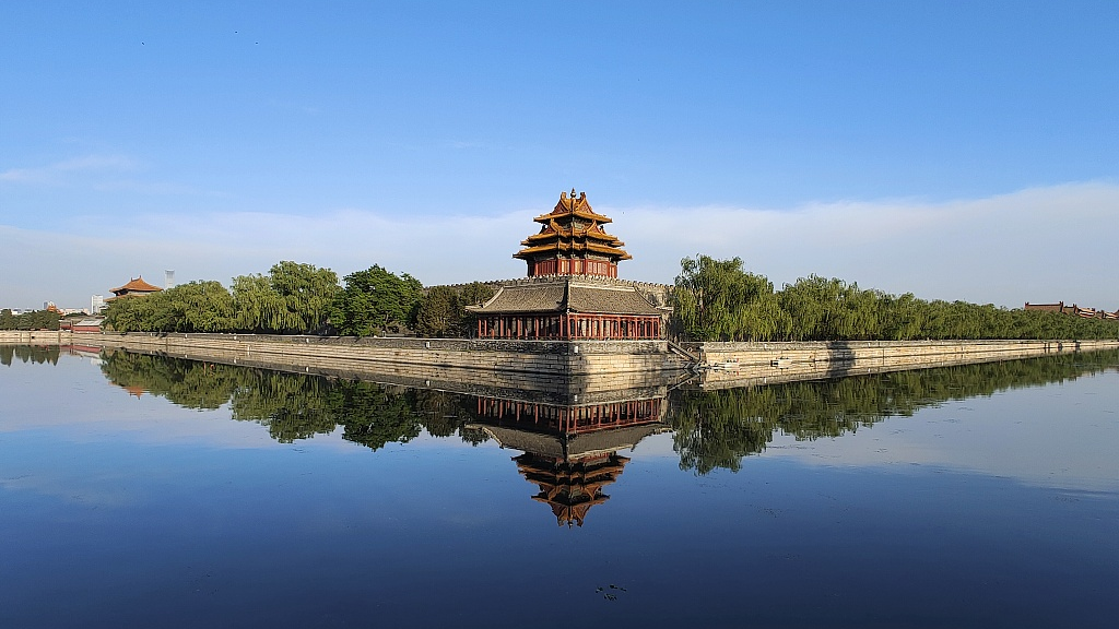 The waters surrounding the Forbidden City reflect the beauty of the ancient corner towers in Beijing, China, on May 13, 2023. /CFP