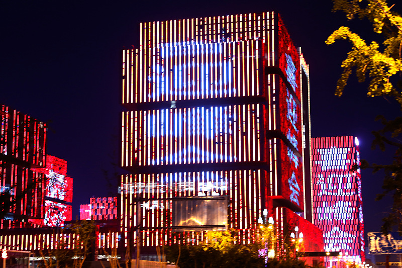 Buildings are decorated with colorful lighting featuring Chinese characters in northwest China's Xian on May 15, 2023. /CFP