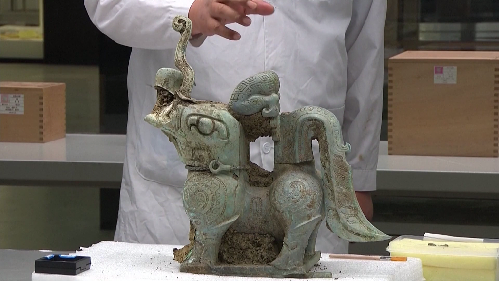 Archaeologists found a mythical beast with four wings during an excavation in 2022 at the Sanxingdui Ruins in Sichuan Province. The never-before-seen bronze beast is the first relic with wings discovered at the site. / CFP
