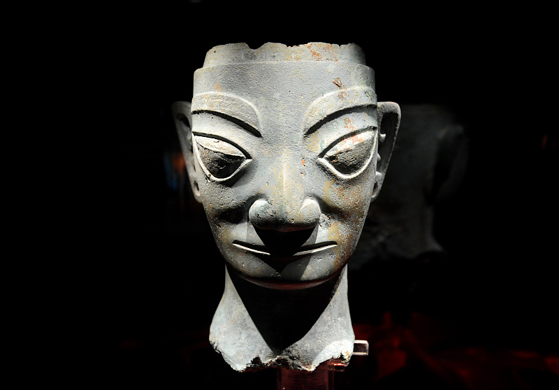 A bronze head from the Sanxingdui Site is on display at Sanxingdui Museum in Guanghan, Sichuan. /CFP