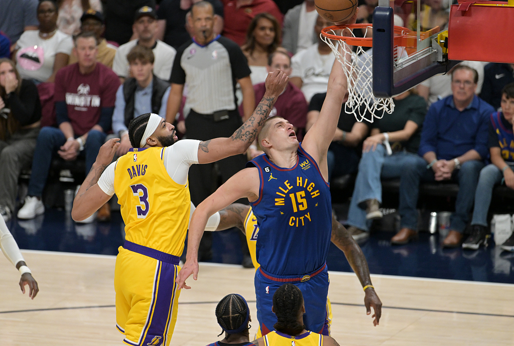 Nikola Jokic (#15) of the Denver Nuggets drives toward the rim in Game 1 of the NBA Western Conference Finals against the Los Angeles Lakers at Ball Arena in Denver, Colorado, May 16, 2023. /CFP