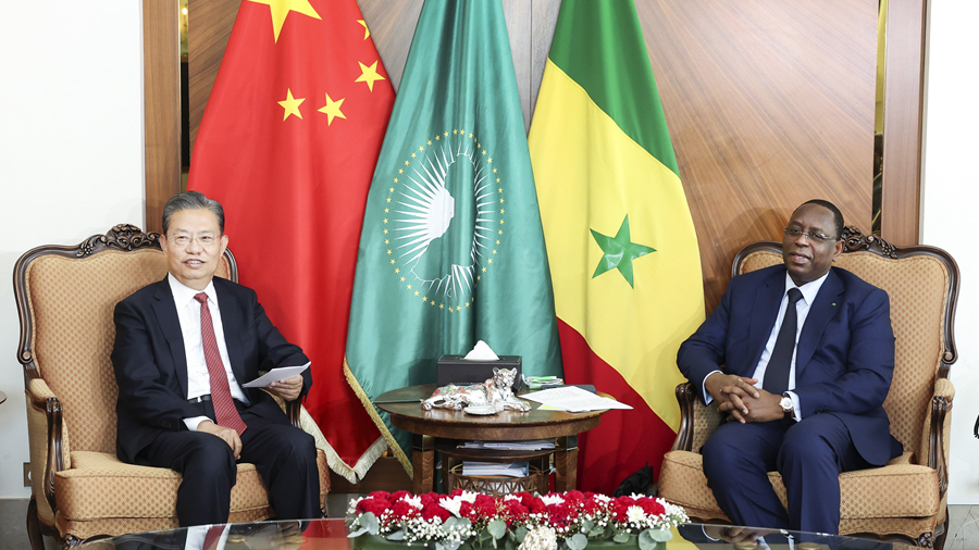 Zhao Leji (L), chairman of the Standing Committee of the National People's Congress of China, meets with Senegalese President Macky Sall in Dakar, Senegal, May 15, 2023. /Xinhua