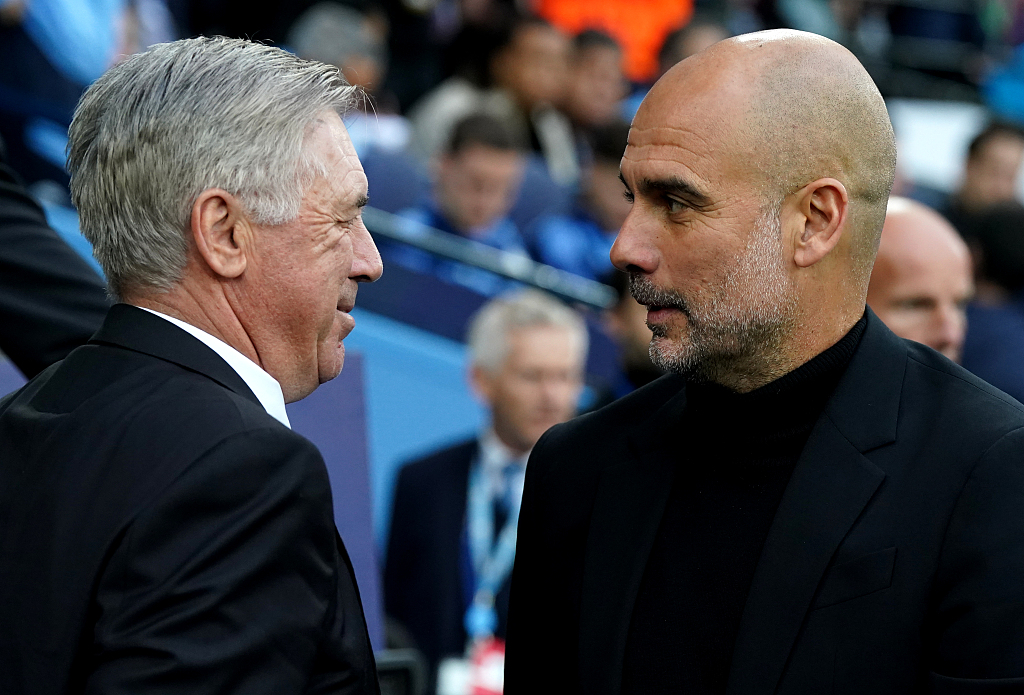 Manchester City manager Pep Guardiola (R) and Real Madrid manager Carlo Ancelotti at Etihad Stadium in Manchester, England, May 17, 2023. /CFP