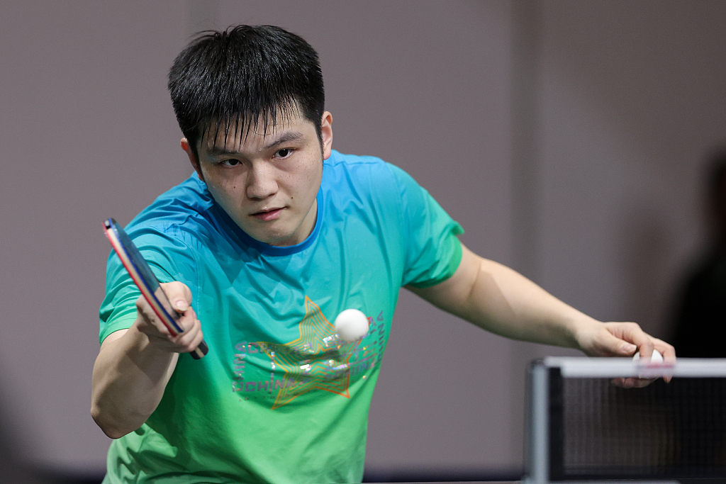 Fan Zhendong of China in practice ahead of the International Table Tennis Federation (ITTF) World Table Tennis Championships Finals in Durban, South Africa, May 18, 2023. /CFP