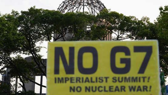 A slogan is pictured at the Hiroshima Peace Memorial Park in a protest against the Group of Seven (G7) summit, in Hiroshima, Japan, May 17, 2023. /Xinhua