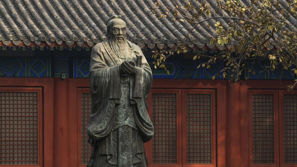 A statue of Confucius at the Imperial Academy, or Guozijian, in Beijing, China. /CFP