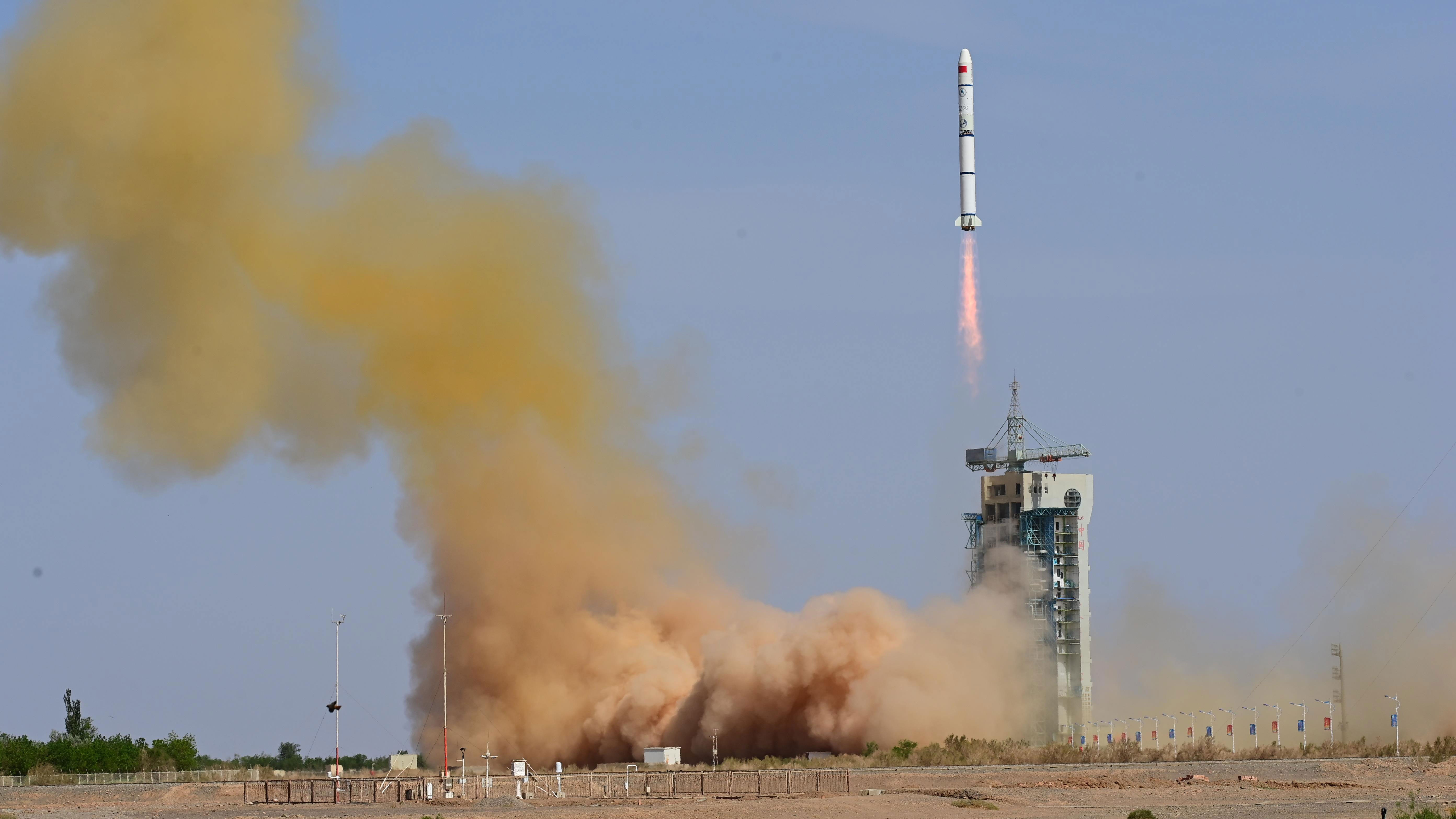 A Long March-2C rocket carrying the Macao Science 1 is launched from the Jiuquan Satellite Launch Center, northwest China, May 21, 2023. /CMG