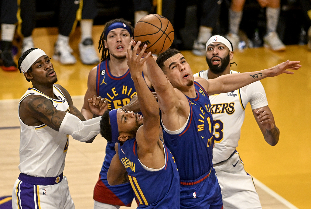 Michael Porter Jr. (#1) and Bruce Brown (#11) of the Denver Nuggets compete for a rebound in Game 3 of the NBA Western Conference Finals against the Los Angeles Lakers at Crypto.com Arena in Los Angeles, California, May 20, 2023. /CFP