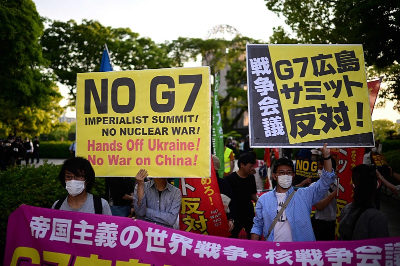 A group of activists takes part in a rally to protest against the G7 Leaders' Summit in Hiroshima, May 17, 2023. /CFP