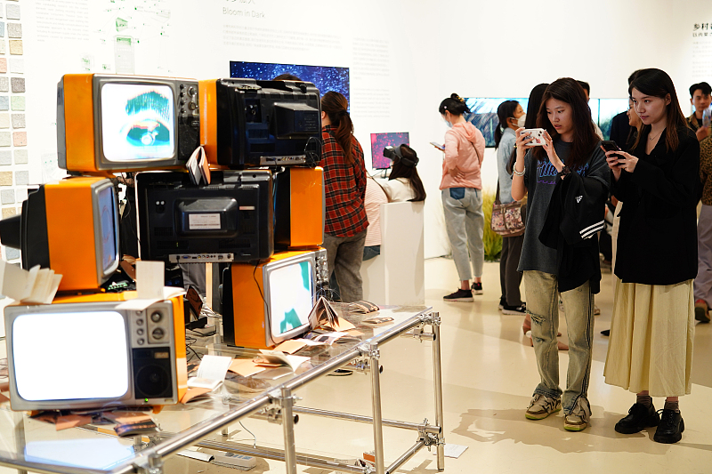 People visit the 2023 graduate students' exhibition at the Central Academy of Fine Arts in Beijing, May 21, 2023. /CFP