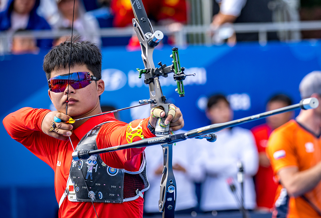 Li Zhongyuan of China competes in the men's recurve final during the Archery World Cup 2023 Stage 2 in Shanghai, China, May 21, 2023. Team China won a silver medal in the category. /CFP