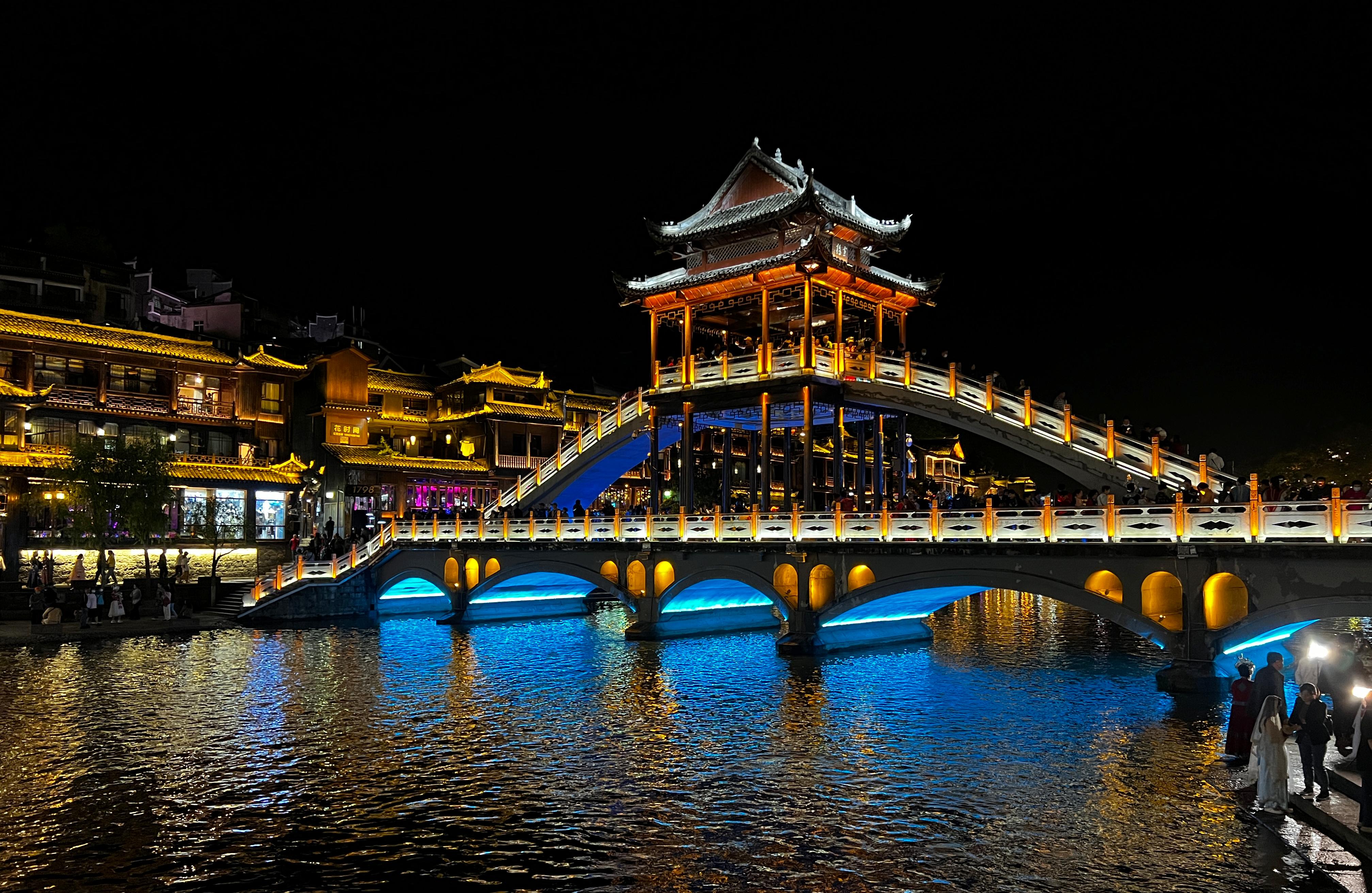 A night view of the Ancient Town of Fenghuang in Hunan Province on May 22, 2023. /CFP