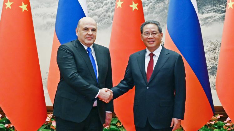 Chinese Premier Li Qiang (R) meets with Prime Minister of the Russian Federation Mikhail Mishustin in Beijing, capital of China, May 24, 2023. /Xinhua 