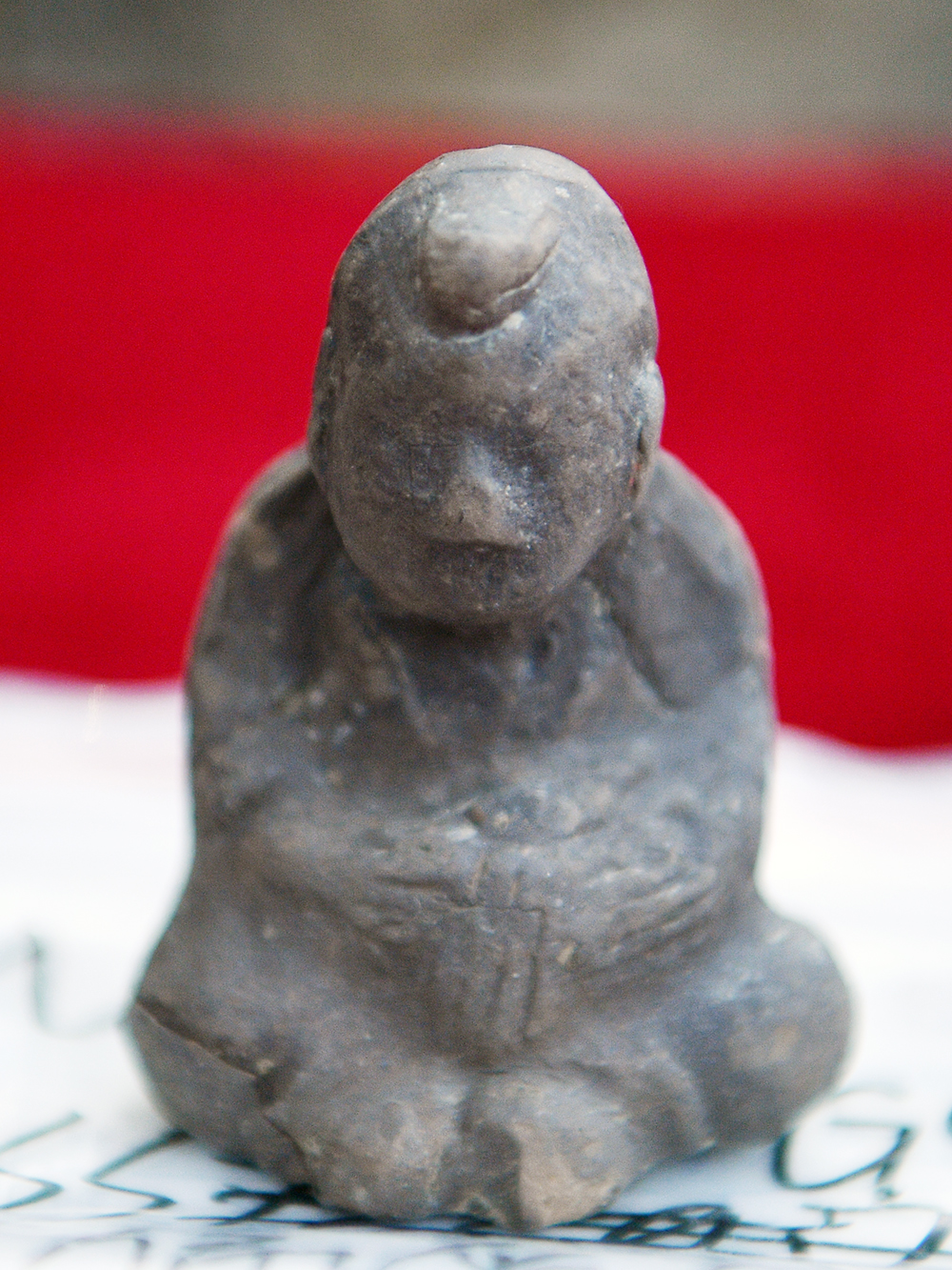 A Mo He Le figurine unearthed from a Song Dynasty site is discovered in the Dongpo District of Meishan, Sichuan in 2019. /CNSPHOTO
