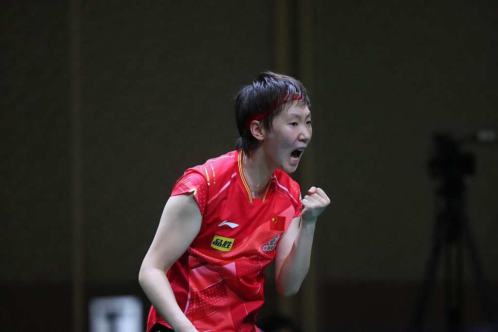Wang Manyu of China celebrates a point during the women's singles third round game at the ITTF World Table Tennis Championships Finals in Durban, South Africa, May 24, 2023. /CFP