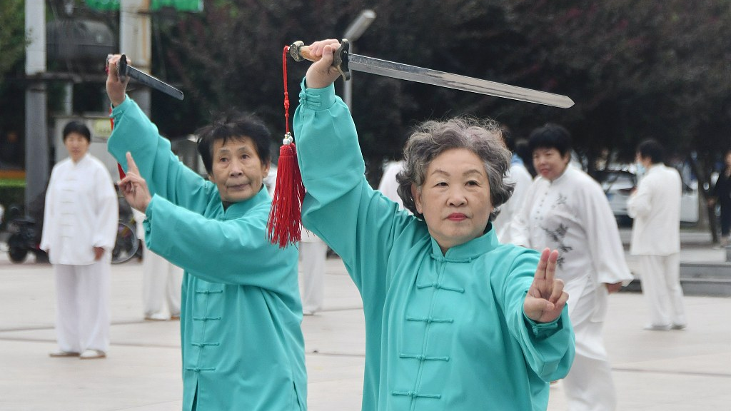 Women perform Tai Chi sword in Handan City, north China's Hebei Province, October 4, 2022. /CFP