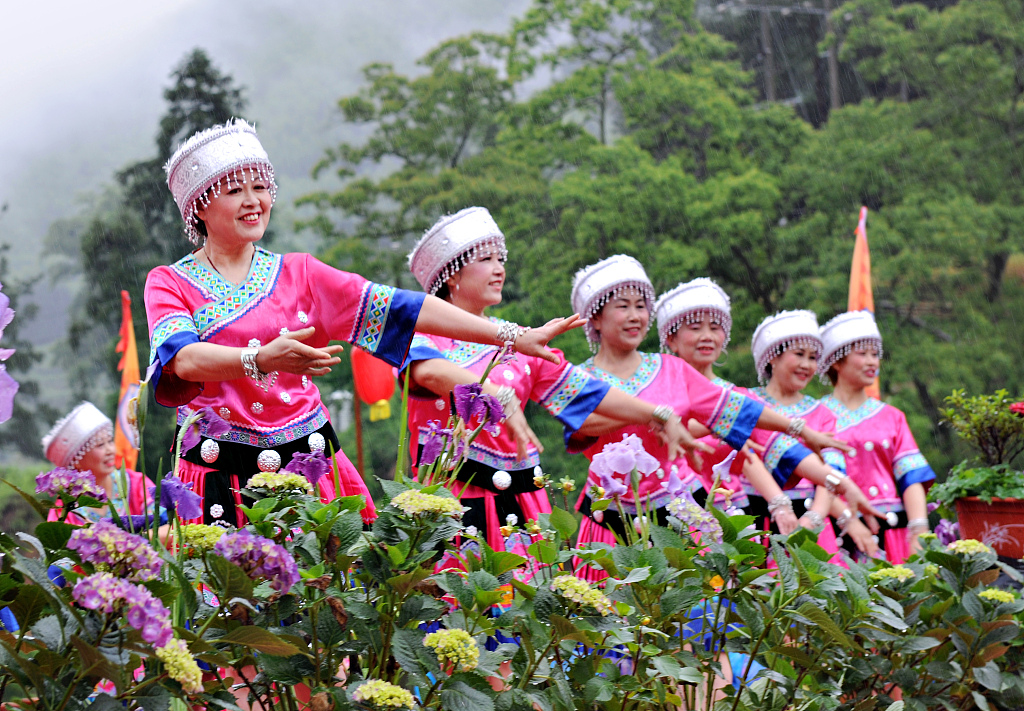 Yao people sing and dance in Damaxi Village of Shaoyang, central China's Hunan Province to celebrate Wufan Festival. /CFP