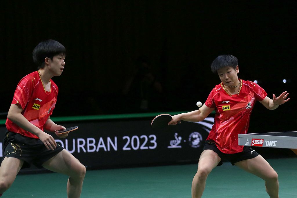 Wang Chuqin (L) and Sun Yingsha of China compete in the International Table Tennis Federation World Table Tennis Championships Finals mixed doubles final against Tomokazu Harimoto and Hina Hayata of Japan in Durban, South Africa, May 26, 2023. /CFP