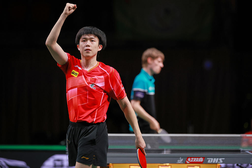 China's Wang Chuqin celebrates after winning his men's singles quarterfinal match at the Table Tennis World Championships Finals in Durban, South Africa, May 26, 2023. /CFP