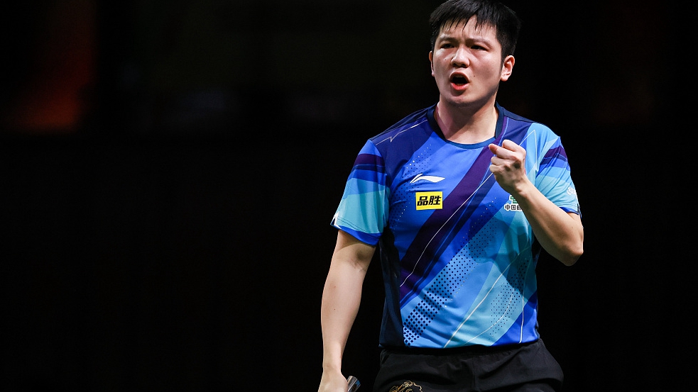 Fan Zhendong of China celebrates during the men's singles game at the World Table Tennis Championships Finals in Durban, South Africa, May 25, 2023. /CFP