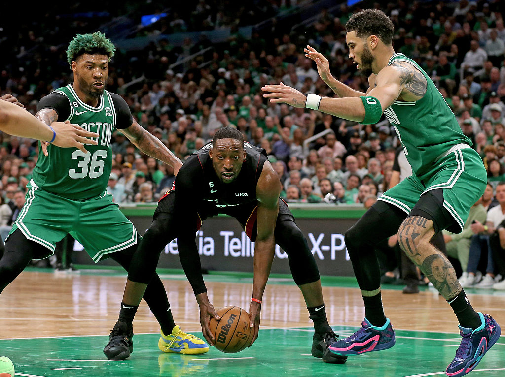 Bam Adebayo (C) of the Miami Heat is double-teamed by defenders of the Boston Celtics in Game 5 of the NBA Eastern Conference Finals at TD Garden in Boston, Massachusetts, May 25, 2023. /CFP