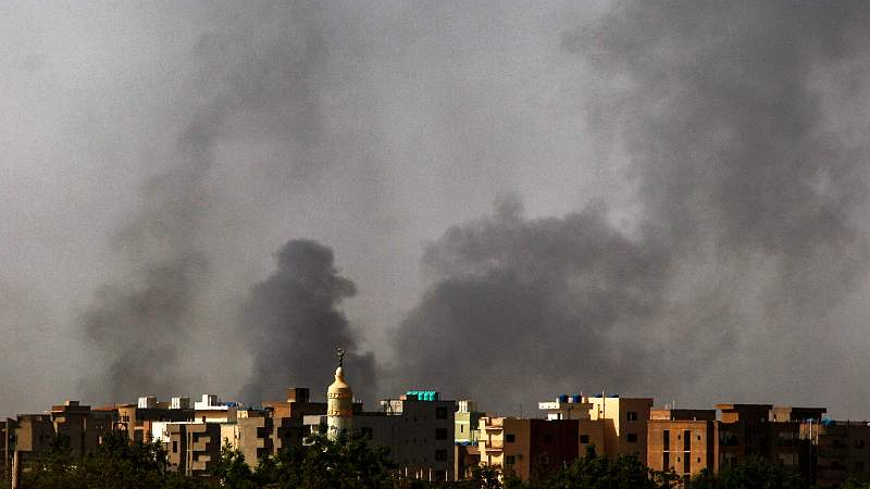 Smoke rises above buildings in Khartoum, capital of Sudan, May 24, 2023. /CFP