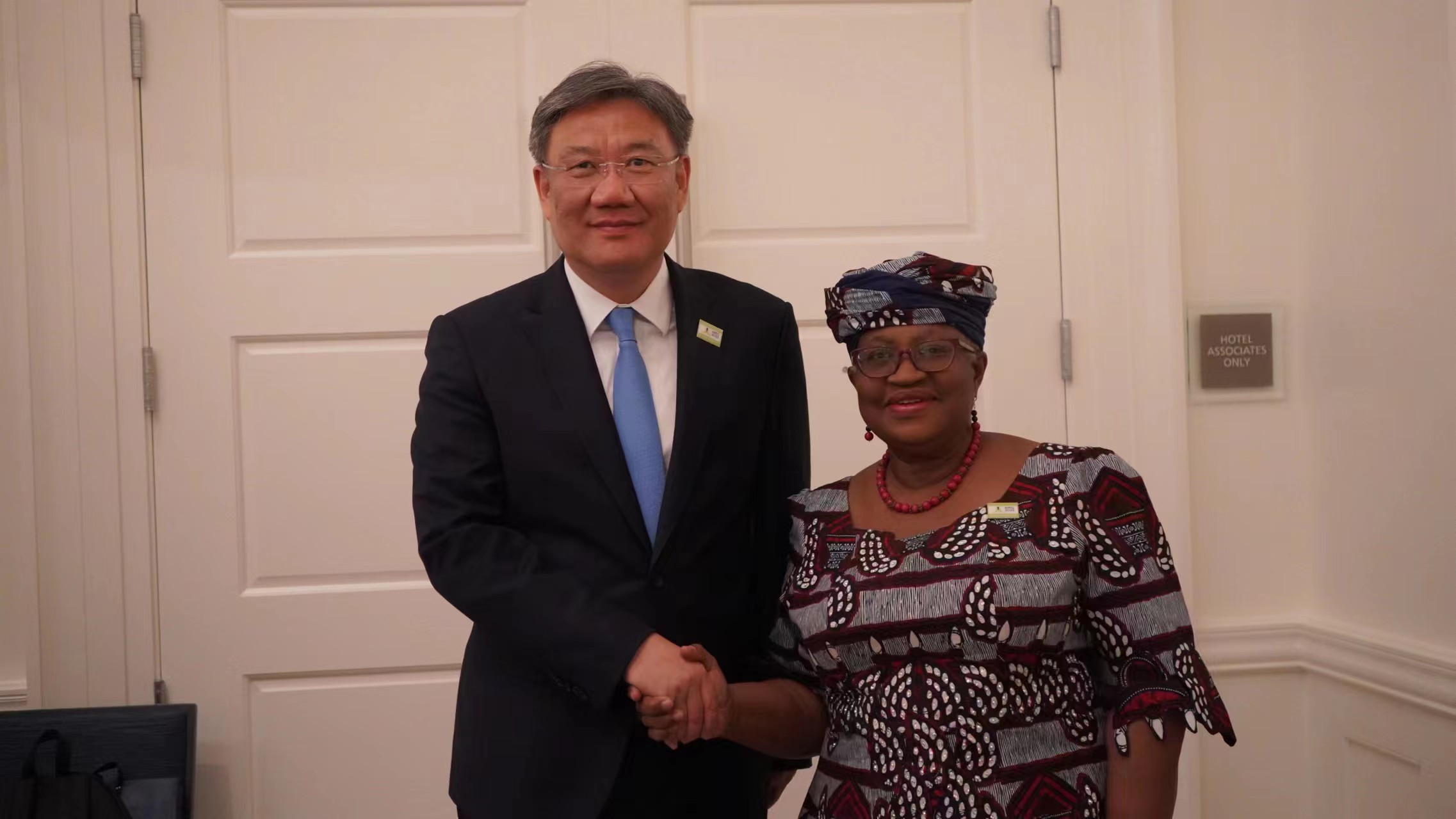 Chinese Commerce Minister Wang Wentao meets with World Trade Organization Director-General Ngozi Okonjo-Iweala during the Asia-Pacific Economic Cooperation Trade Ministers' Meeting in Detroit, U.S., May 26, 2023. / China's Ministry of Commerce