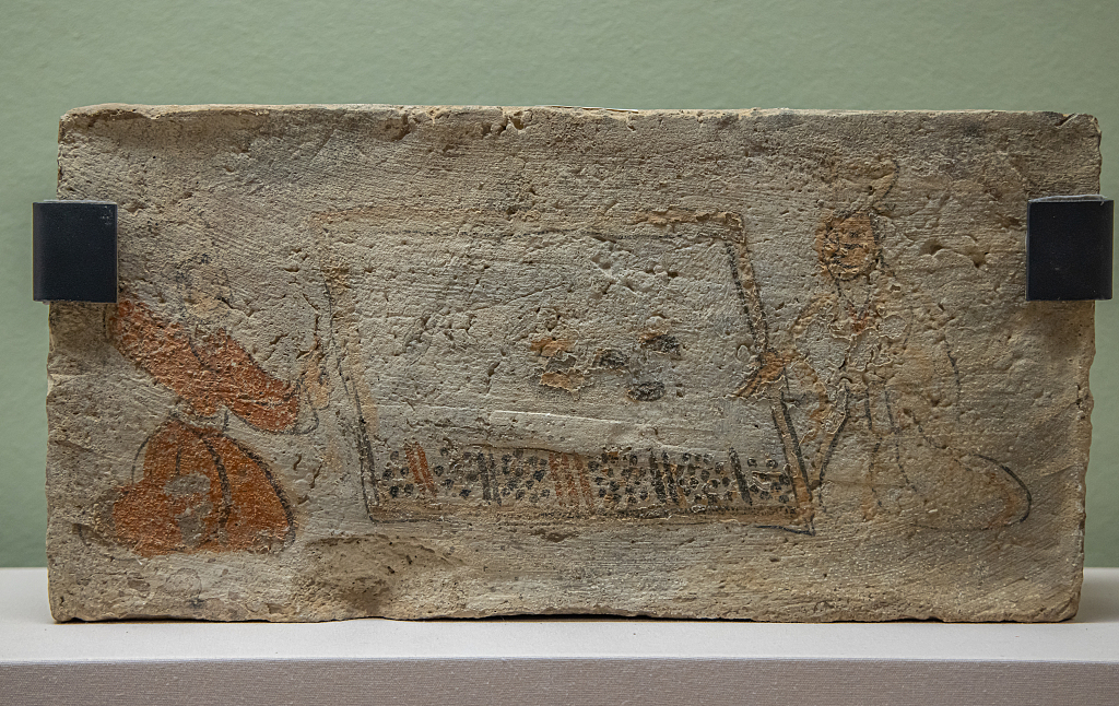 A painted liubo mural brick unearthed in Zhangye of northwest China's Gansu Province is seen in this undated photo. /CFP 