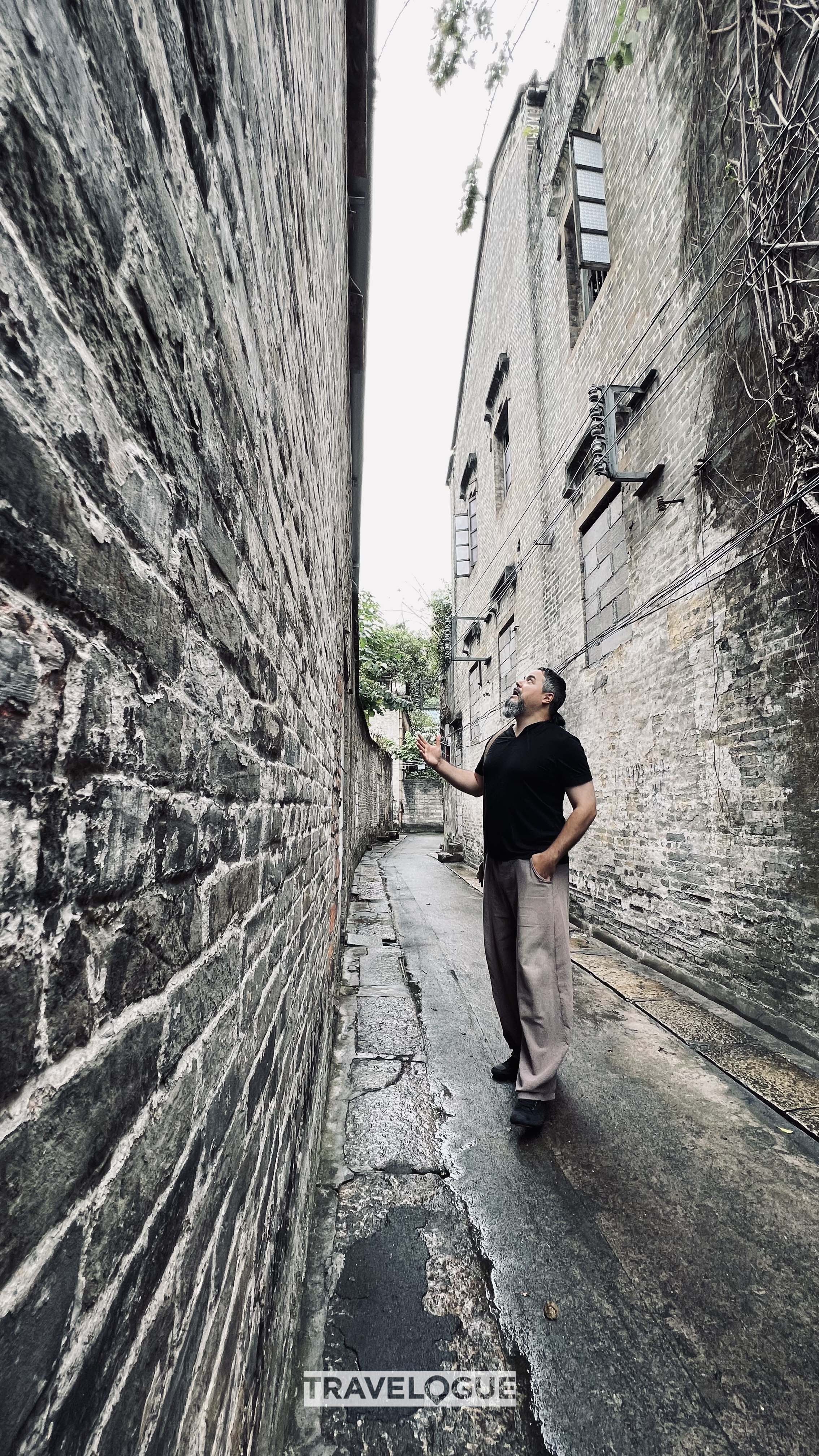 An undated photo shows a tourist sightseeing around the old streets of Foshan, Guangdong Province. /CGTN