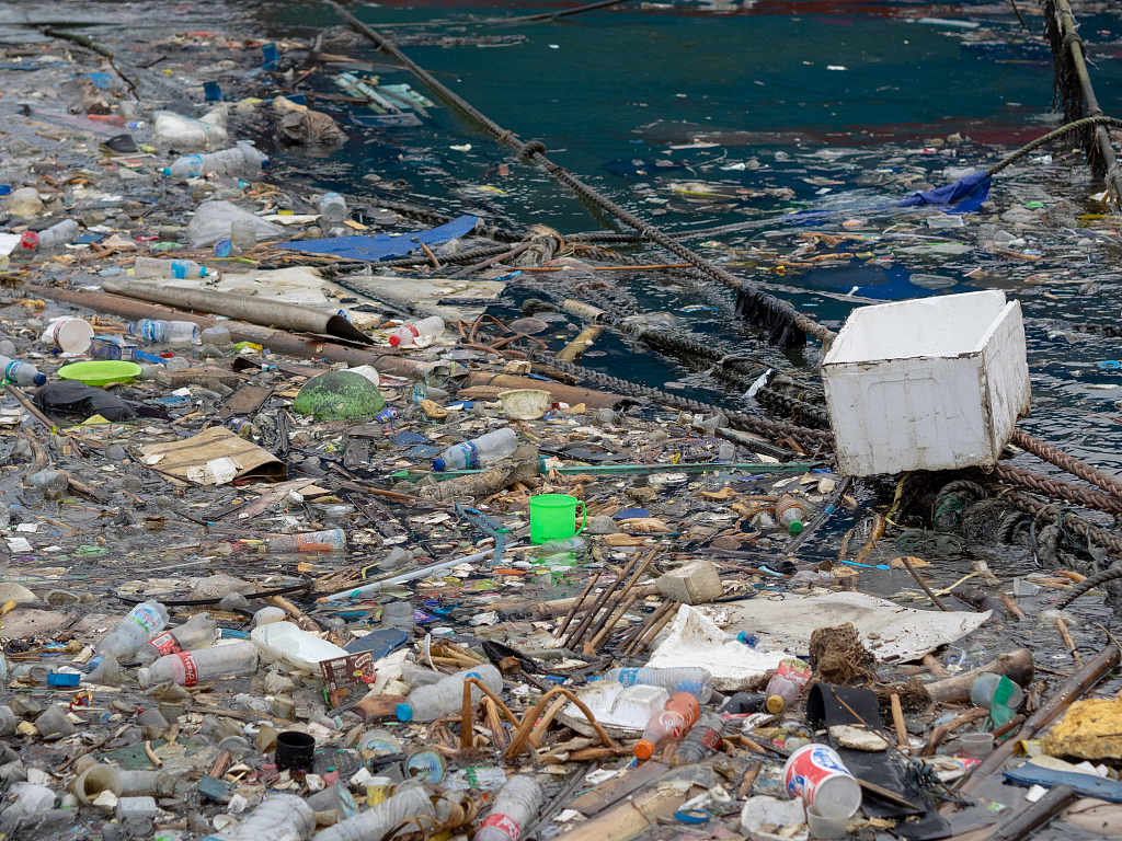 Piles of garbage polluting Muara Baru port in Jakarta, Indonesia, May 22, 2023. /CFP