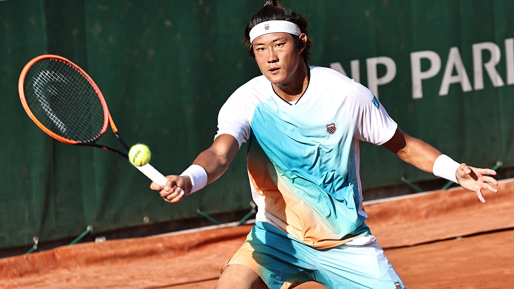 China's Zhang Zhizhen in action during the opening round of the French Open at Roland Garros, Paris, France, May 29, 2023. /CFP