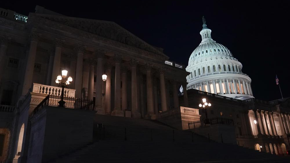 Lights illuminate the Capitol after House Speaker Kevin McCarthy announced that he and President Joe Biden had reached an 